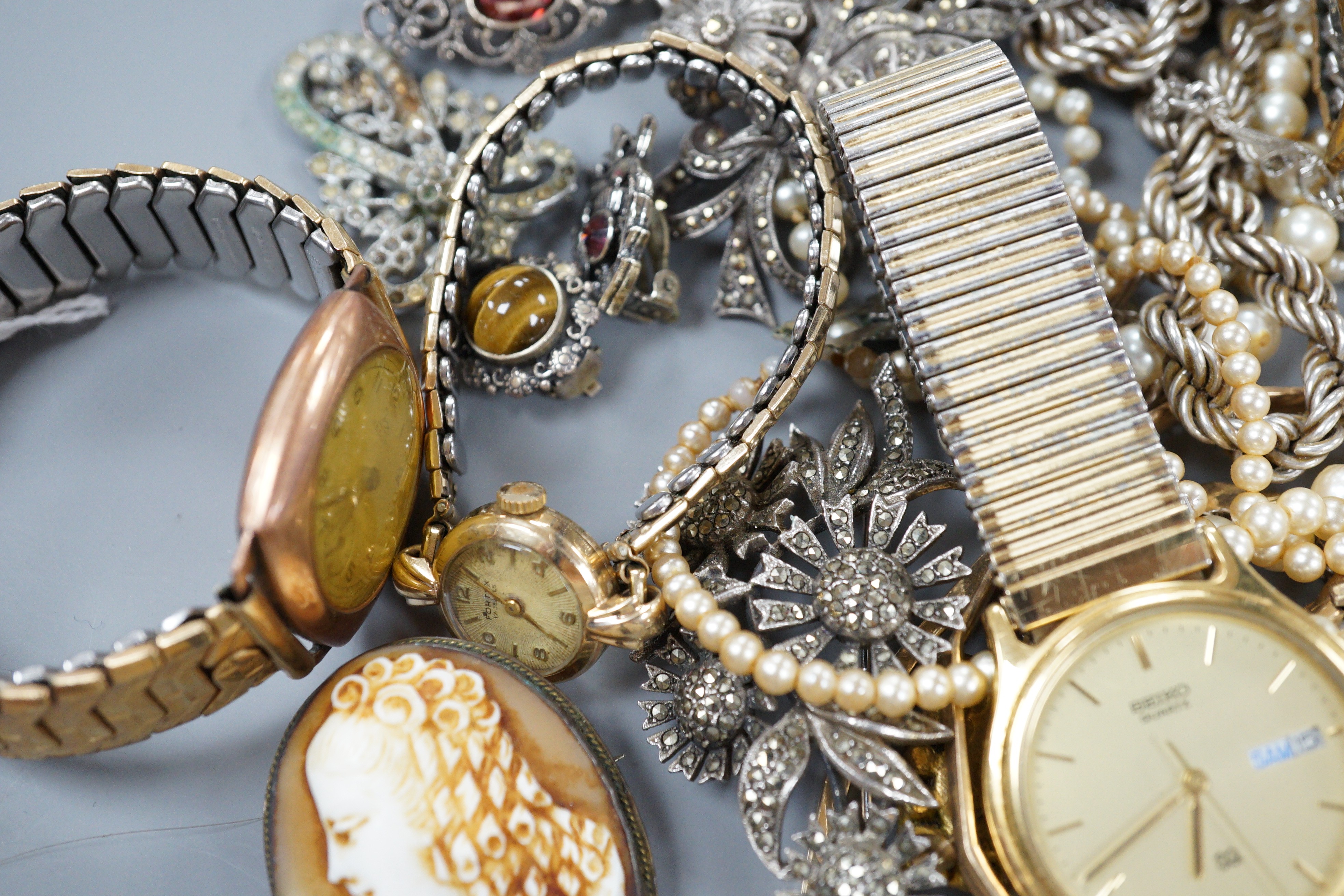 A quantity of assorted costume jewellery, including marcasite and three gentleman's wrist watches including a 9ct Record.